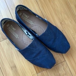 NWOB. Toms navy blue slip ons. Size 8.